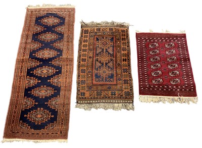 Lot 125 - A hand woven Caucasian mat with geometric...