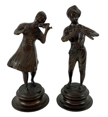 Lot 706 - A pair of modern bronze figures of musicians,...