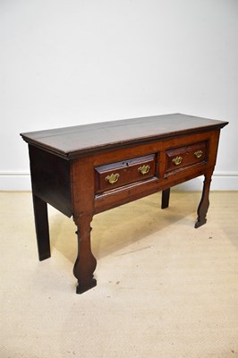 Lot 121 - A small 18th century oak dresser with two...