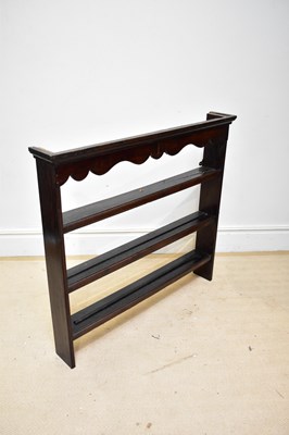 Lot 111 - An 18th century oak open plate rack.