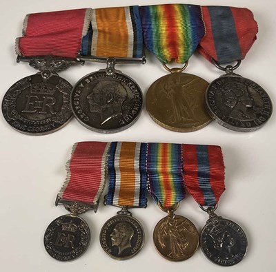 Lot 106 - A four medal group comprising a pair of WWI...