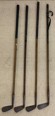 Lot 1934 - Four early 20th century hickory shafted golf...