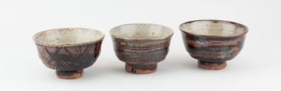 Lot 388 - JIM MALONE (born 1946); a trio of stoneware...