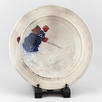 Lot 585 - ROBIN WELCH (1936-2019); a large raku dish...