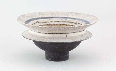 Lot 581 - ROBIN WELCH (1936-2019); a flanged raku bowl...