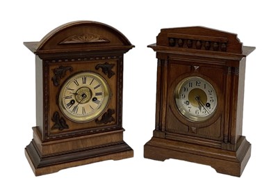 Lot 151 - An early 20th century oak cased mantel clock...