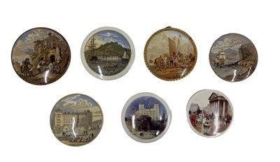 Lot 665 - A collection of seven pot lids.