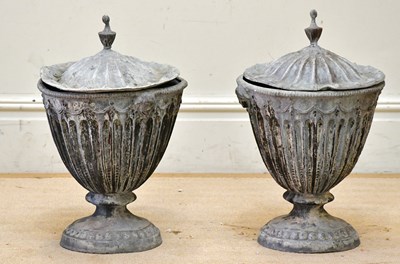 Lot 236 - A pair of Regency style lead pedestal garden...