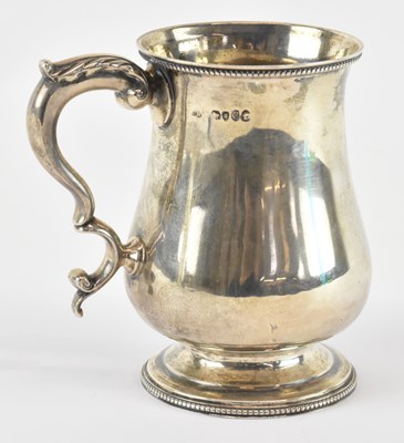 Lot 1200 - A Victorian hallmarked silver mug, London 1878,...