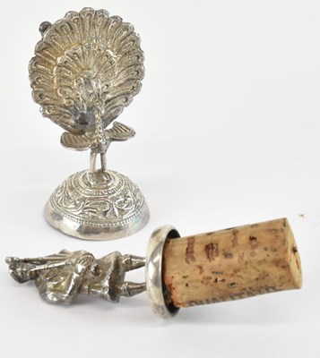 Lot 1226 - A white metal bottle cork modelled as a...