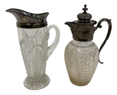 Lot 1188 - A white metal mounted cut glass claret jug,...