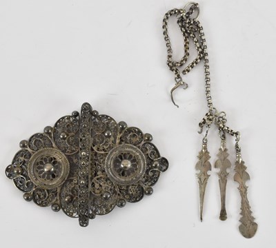 Lot 1350 - An Indian white metal filigree belt buckle, 9...