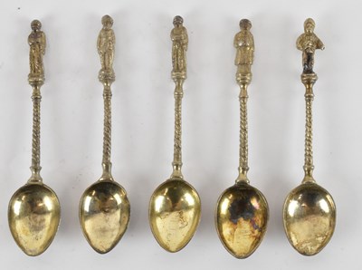 Lot 1227 - A set of five white metal apostle teaspoons,...