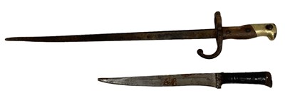 Lot 396 - An Islamic dagger, length 35cm, and a WWII...