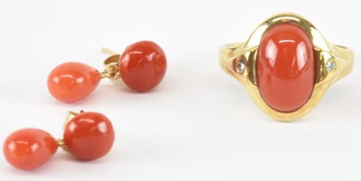 Lot 1295 - A 9ct yellow gold coral set ring, size L, and...