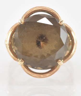 Lot 1283 - A 14ct yellow gold topaz set ring, size M,...