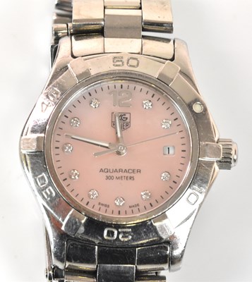 Lot 1326 - TAG HEUER; a lady's stainless steel Aquaracer...