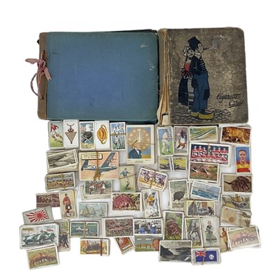 Lot 470 - A large quantity of cigarette cards, in two...