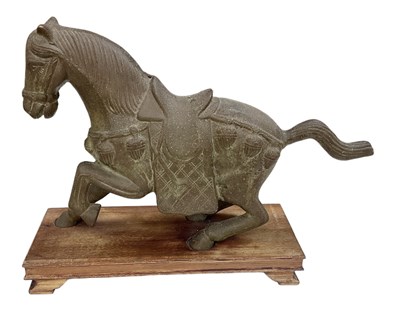 Lot 1038 - An early 20th century Chinese Tang style horse,...