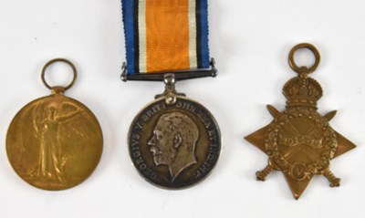 Lot 398 - A WWI medal trio comprising a 1914-1915 Star,...