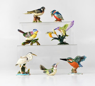 Lot 377 - Seven enamelled trinket boxes in the form of...