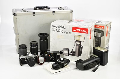 Lot 1175 - A collection of cameras and photography...