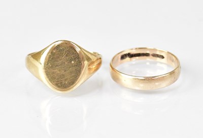 Lot 612 - A 9ct yellow gold wedding band, size N and a...