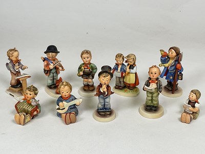 Lot 237 - GOEBEL: ten ceramic figures all with different...