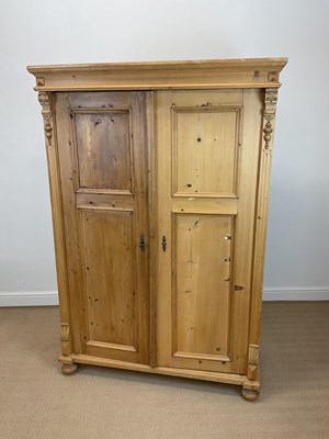 Lot 779 - A rustic pine wardrobe, height 175cm, width...