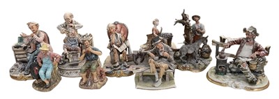 Lot 601 - CAPODIMONTE; eight Italian porcelain figures...