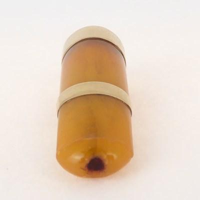 Lot 1061 - A vintage amber cheroot holder with yellow...