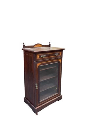 Lot 65 - An Edwardian mahogany and inlaid music cabinet,...