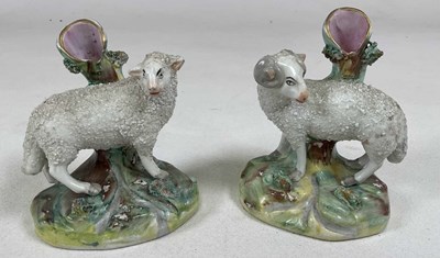 Lot 240 - A pair of 19th century Staffordshire spill...