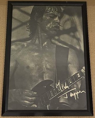 Lot 1871 - MICK JAGGER; a black and white photographic...