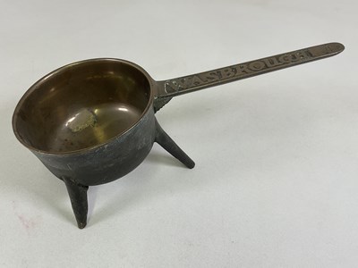 Lot 311 - WASBROUGH; a bronze skillet on three legs, the...