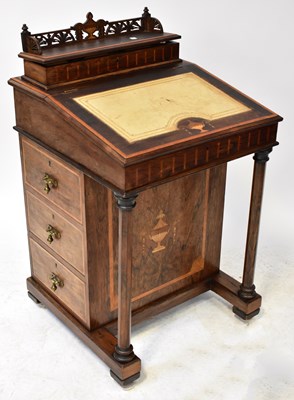 Lot 83 - A Victorian walnut inlaid Davenport, the upper...