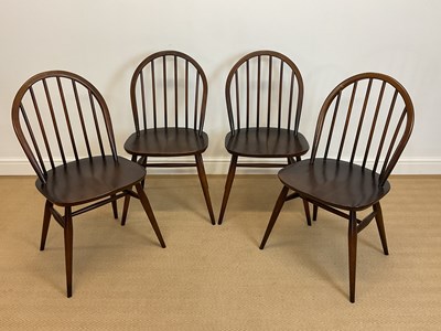 Lot 804 - ERCOL; set of four Windsor bow back dining...