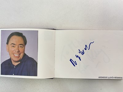 Lot 1567 - An autograph album containing signed pages for...