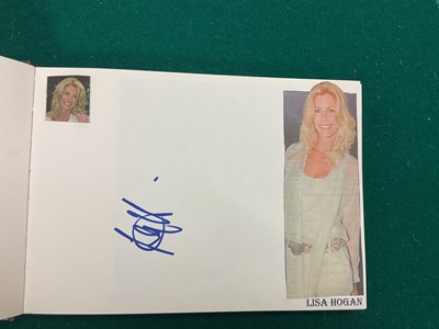 Lot 1567 - An autograph album containing signed pages for...