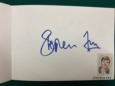 Lot 1567 - An autograph album containing signed pages for...
