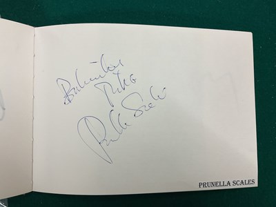 Lot 1567 - An autograph album containing signed pages for...