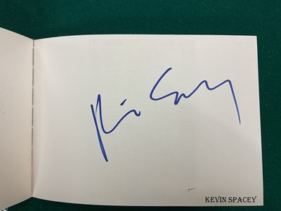 Lot 1567 - An autograph album containing signed pages for...