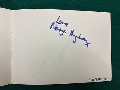 Lot 1567 - An autograph album containing signed pages for...