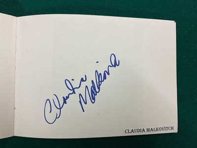 Lot 1567 - An autograph album containing signed pages for...