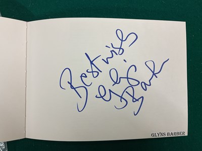 Lot 1567 - An autograph album containing signed pages for...