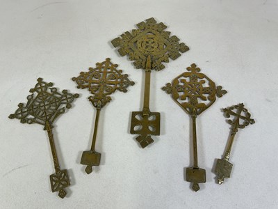 Lot 312 - Five brass Coptic crosses, largest height 39cm.