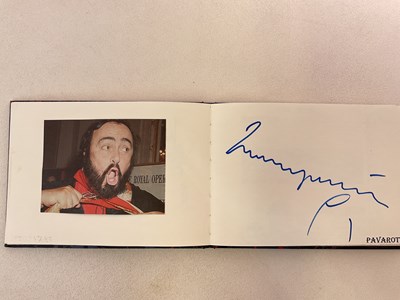 Lot 1594 - An autograph album with pages signed by...