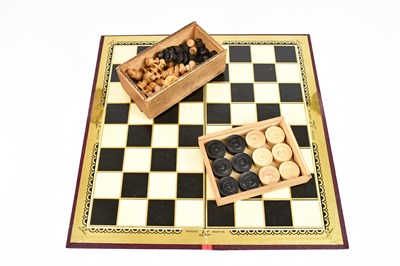 Lot 750 - A House Martin chessboard with chess pieces,...