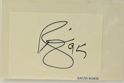 Lot 1649 - DAVID BOWIE; a card signed in black marker and...