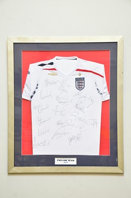 Lot 1105 - ENGLAND; a signed 2008 football shirt, signed...